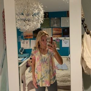 tie dye shirt and surf shop shirt!